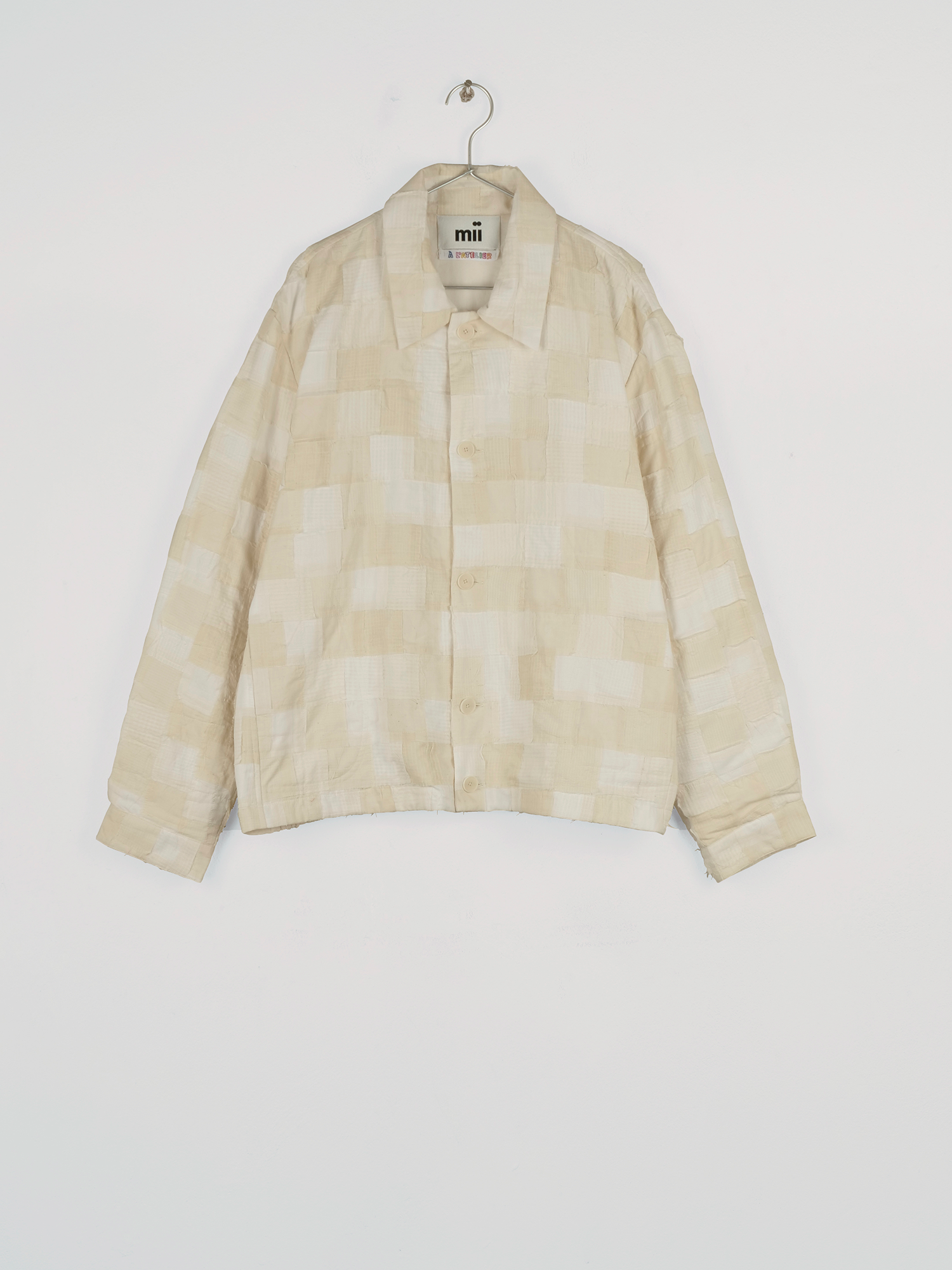 veste-mani-sculptrice-ecru